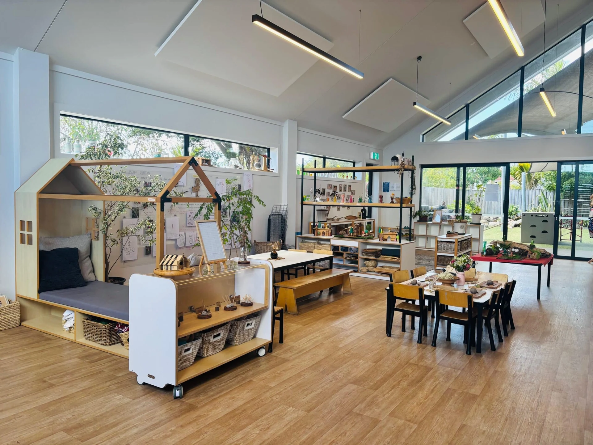 Bright, modern classroom with play areas