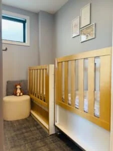 Cozy nursery with cribs and decor